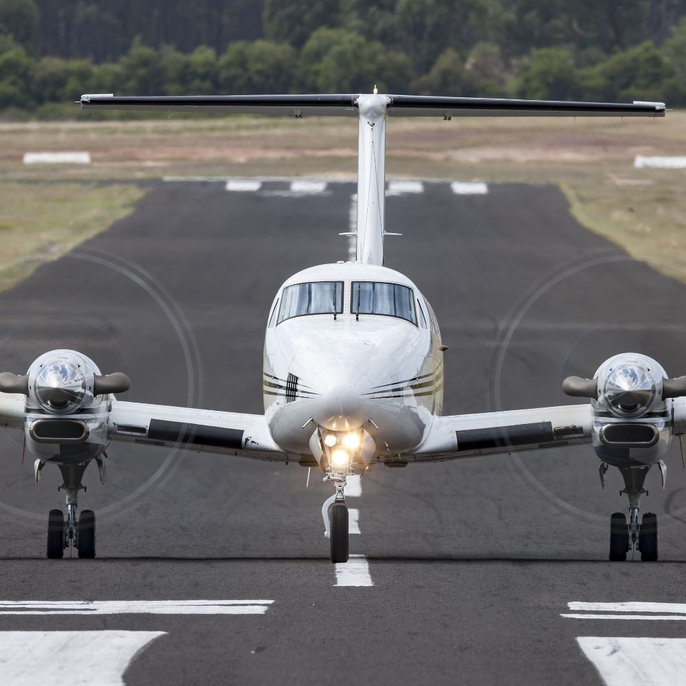 King Air taxiing on runway